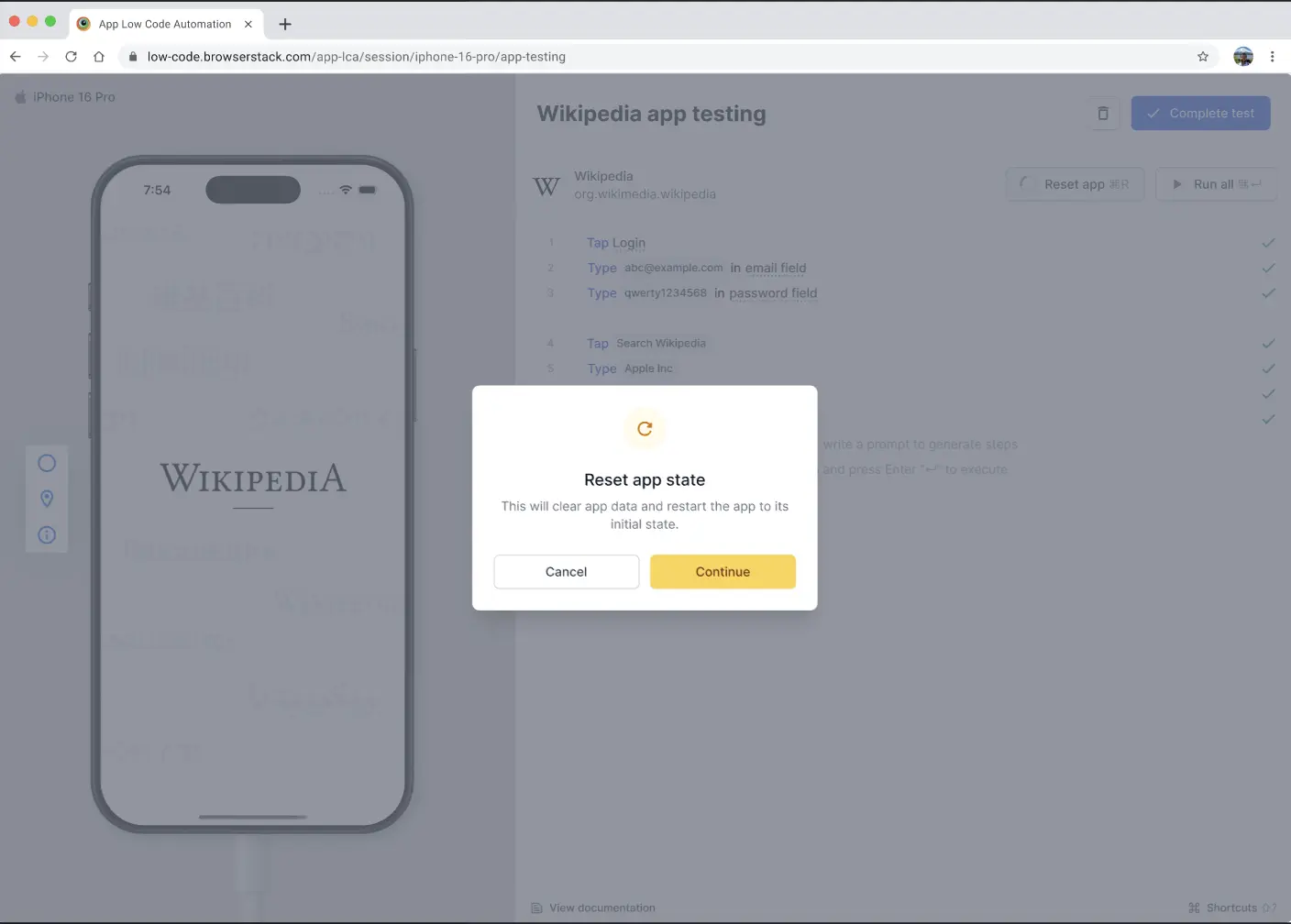 Reset app state dialog with spinning loader icon, Cancel and Continue buttons
