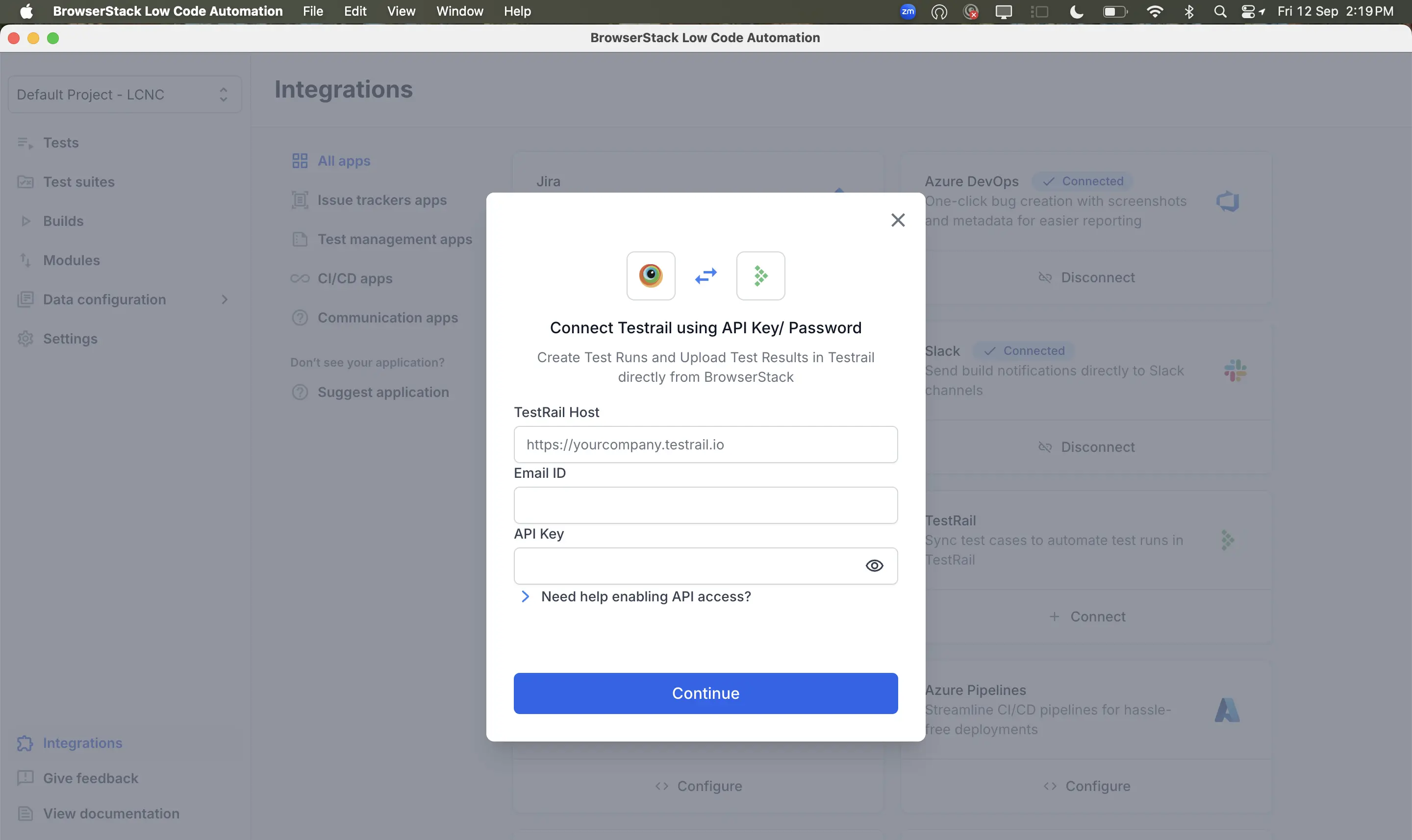 Connect TestRail using API Key/Password dialog in BrowserStack Low Code Automation. Enter TestRail host, email ID, and API key, then click Continue.