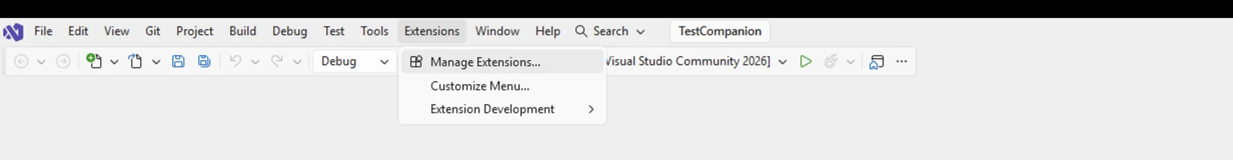 Extensions menu open in Visual Studio with the Manage Extensions command highlighted